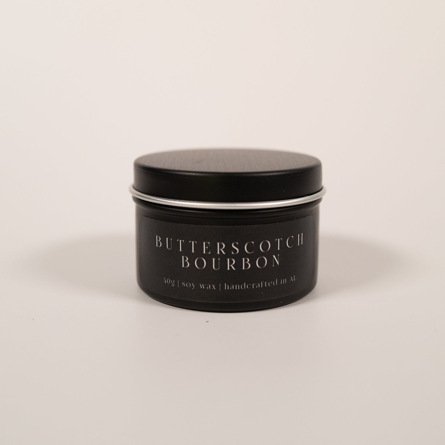 “Butterscotch Bourbon” small tin candle — a magical gift for Harry Potter fans and book lovers, inspired by the wizarding world.