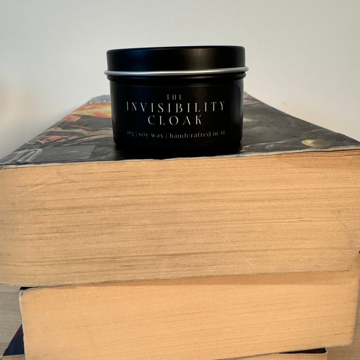 “The Invisibility Cloak” small tin candle — gift for Harry Potter fans and book lovers, inspired by the wizarding world.