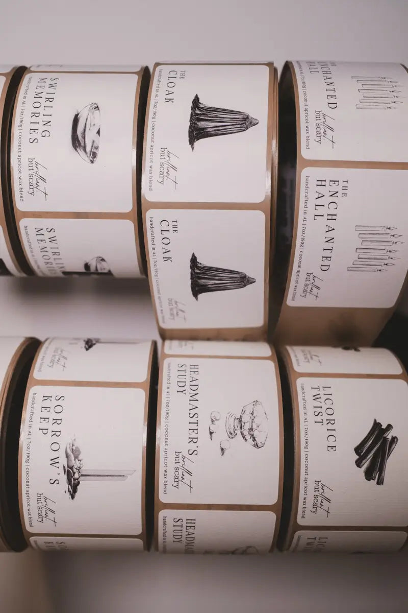 Close-up of handmade candle label rolls for bookish candles - Brilliant but Scary small batch production