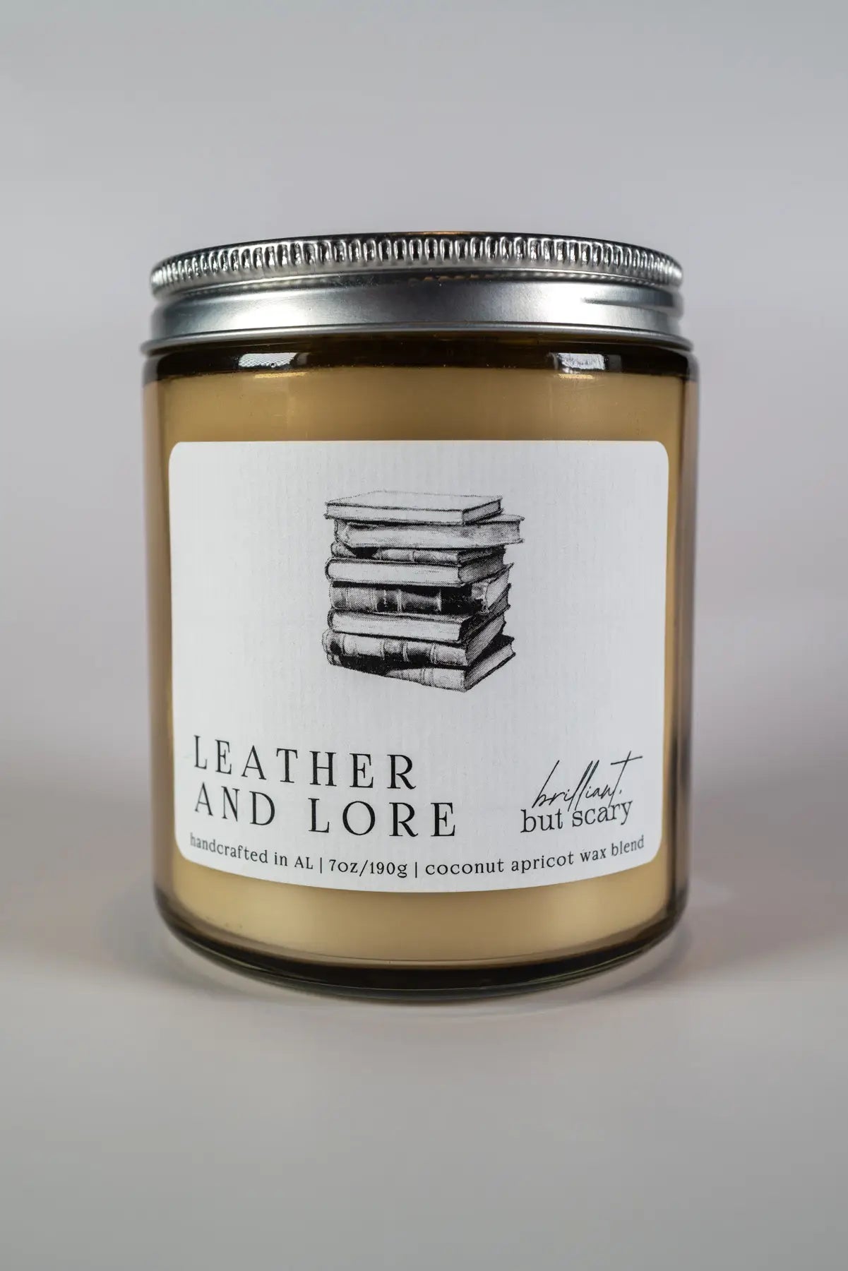 Leather and Lore bookish candle in oatmeal jar - Brilliant but Scary
