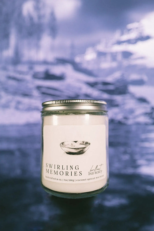 Swirling Memories fantasy candle in clear jar on dark winter lake - Brilliant but Scary