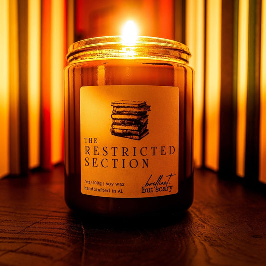 “The Restricted Section” candle — handcrafted soy wax, inspired by the wizarding world, a magical gift for Harry Potter fans.