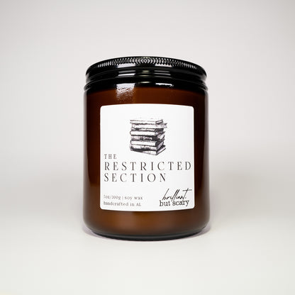 Handcrafted Restricted Section soy wax candle for fantasy book readers, potterheads, wizards, and non-magic folk.