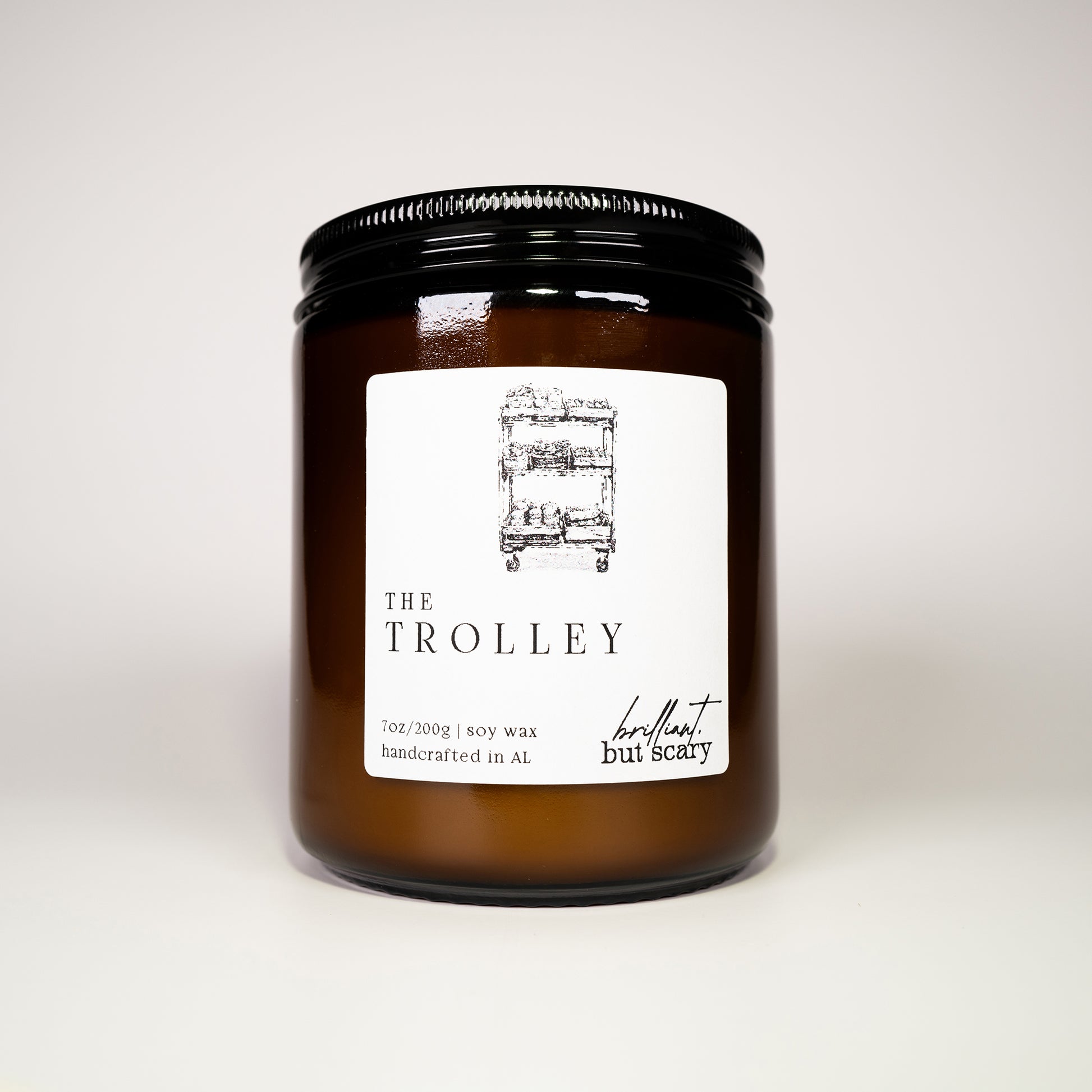 Handcrafted Trolley soy wax candle for fantasy book readers, potterheads, wizards, and non-magic folk.